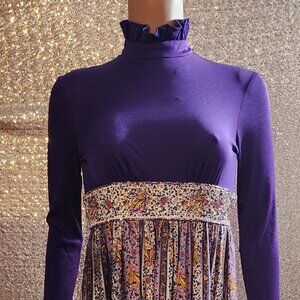 Vintage long-sleeved purple maxi dress with a floral patterned.
